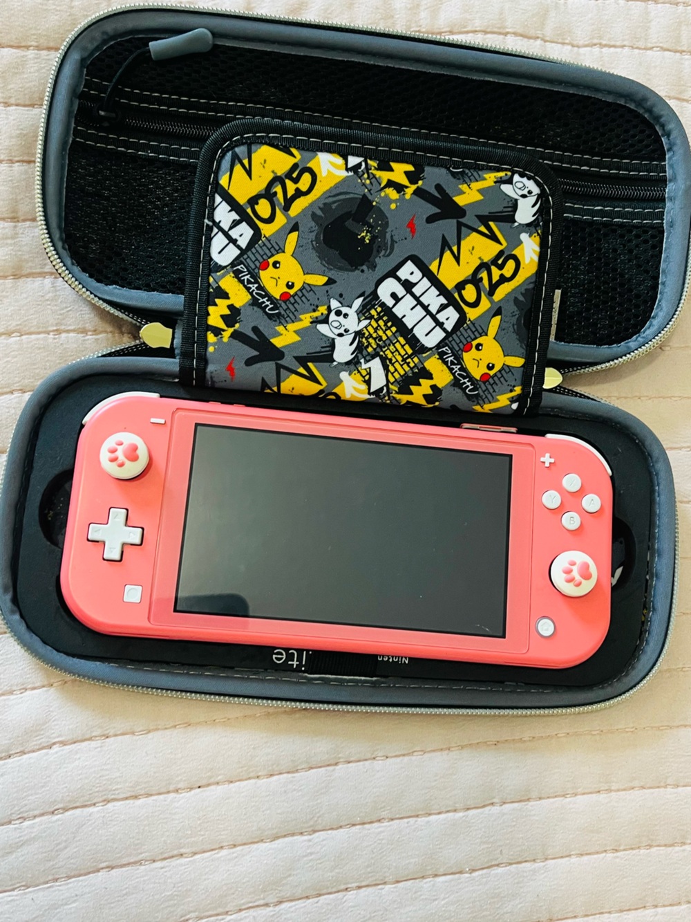 Nintendo Switch Lite Coral Pink Handheld Console with Paw Joy-Con Covers